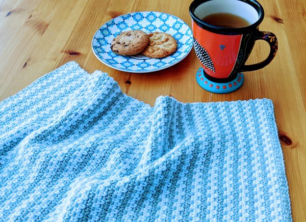 crochet tea towel on table