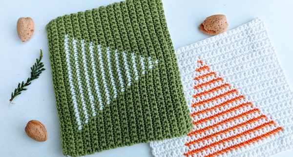 christmas tree in green and white and orange potholders