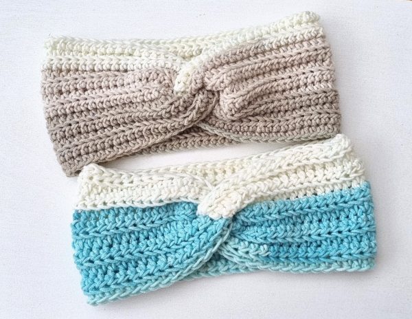 two crocheted headbands with a twist in beige and blue