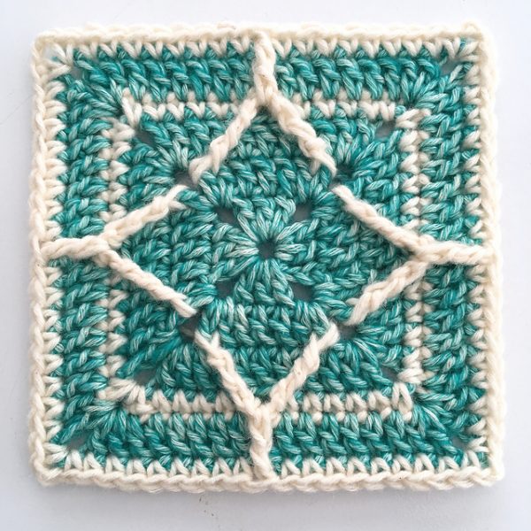 unusual granny square in green and white diamond shaped pattern