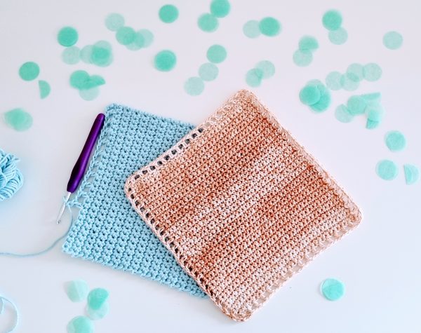 two crochet dishcloths in blue and beige