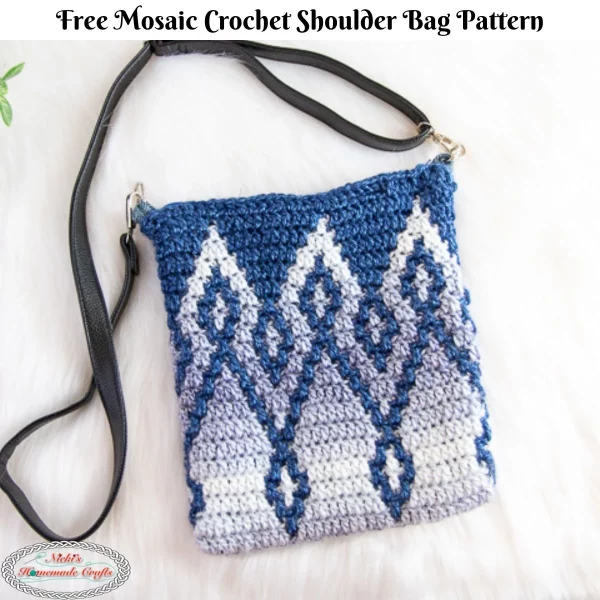 Blue crochet bag with a white pattern on a white faux fur background.
