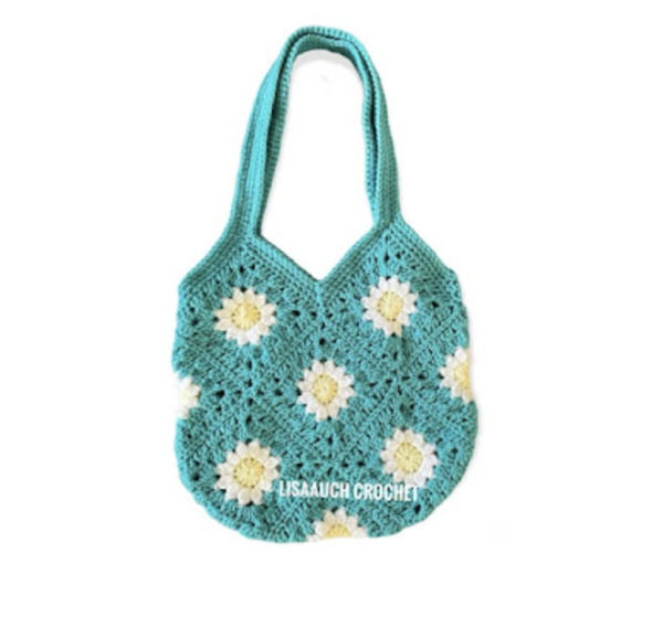 Turquoise crochet granny square bag with a white and yellow center.